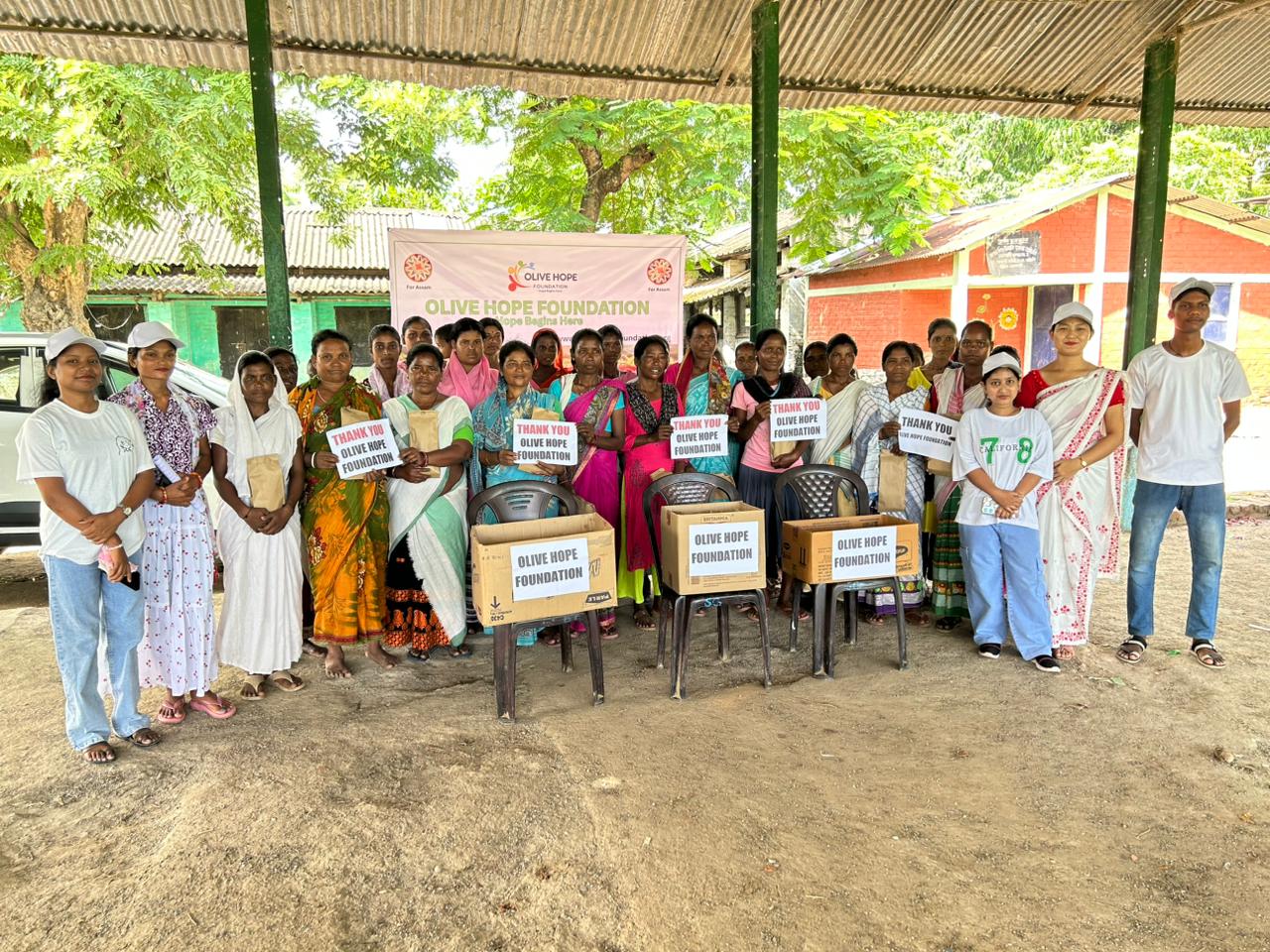Olive Hope Foundation community outreach with women and volunteers